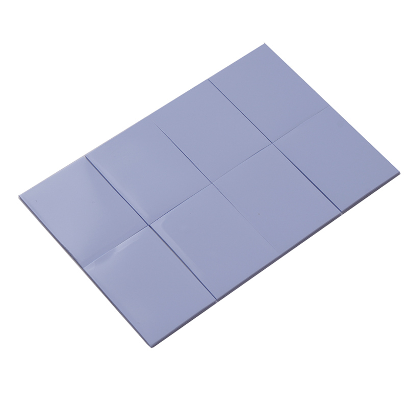 Feuille de silicone conductrice thermique bleue, feuille de silicone à puce IC absorbant des chocs, évier de chaleur électronique et électrique